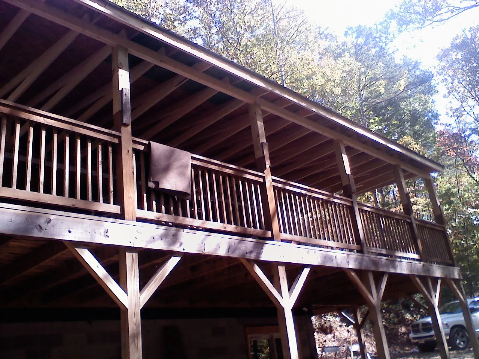 Timber framing under a new elevated porch and deck — Roof Leak Repair in West Union by Roofing Brothers
